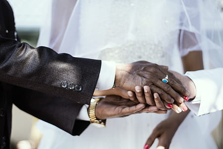 man holding hand of the groom thumbnail