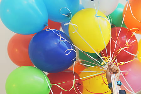 person holding party balloon lot thumbnail