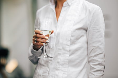 Glasses of orange juice, wine and water thumbnail