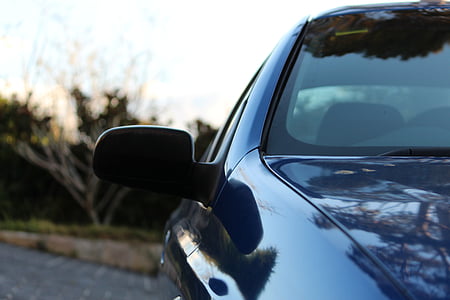 shallow focus photography of black vehicle thumbnail