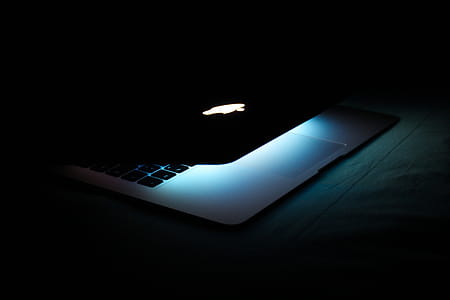 Photography of a Turned On Macbook thumbnail