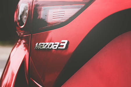 close-up photo of Mazda 3 emblem thumbnail