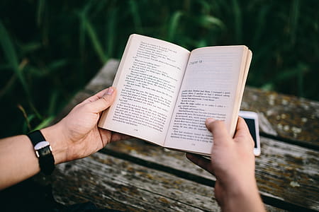 Reading book at lake thumbnail