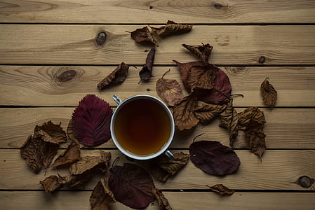 tea with dried leaves on wooden board thumbnail