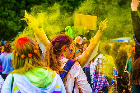 holi festival walking on street during daytime thumbnail