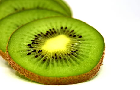macro shot photography of sliced kiwi fruit thumbnail