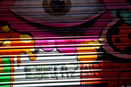 Close-up details of some vibrant street art in the Gothic Quarter of Barcelona, Spain thumbnail