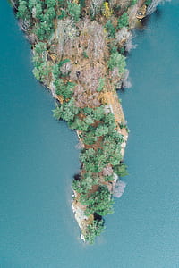 aerial photography of island at daytime thumbnail