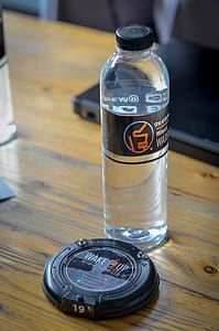 Drinking Water in Bottle and Plastic Glass thumbnail