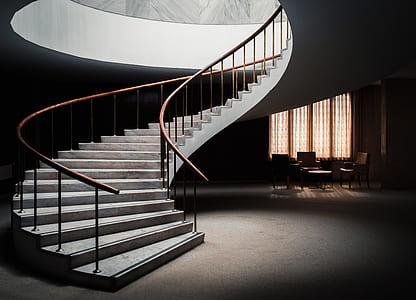 white concrete staircase inside a house thumbnail