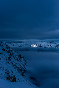white mountain during night thumbnail