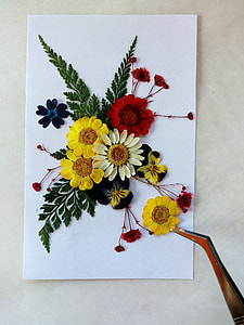 yellow, red, and white petaled flower wall decor thumbnail