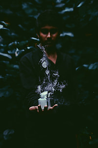 man holding jar with smoke thumbnail