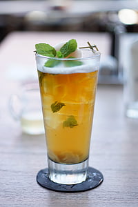 glass of beverage with mint leaves thumbnail