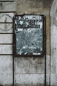 focus photo of black and gray board leaning on wall thumbnail