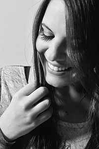grayscale photo of woman smiling thumbnail