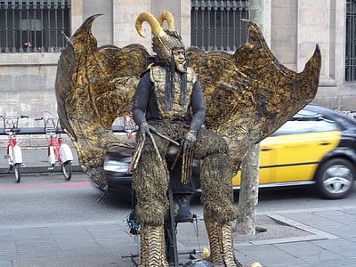 man wearing demon costume sitting on chair thumbnail
