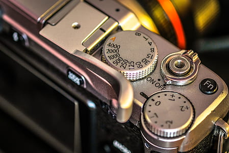 selective focus photography of digital camera thumbnail