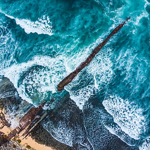 aerial photography of ocean waves thumbnail