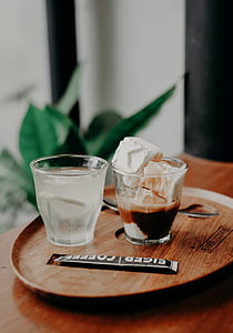 closeup photo of two drinking glass with liquid inside thumbnail