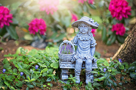 girl holding basket concrete statuette thumbnail