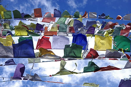 assorted handkerchiefs under blue sky thumbnail