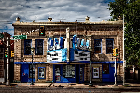 brown brick building under white sky thumbnail