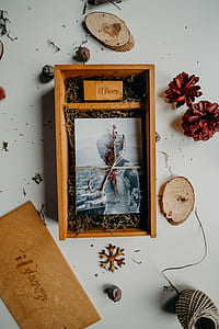 photo of woman in white wedding dress on brown box thumbnail