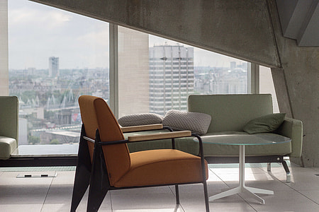photo of 2-padded chairs and table near glass window thumbnail