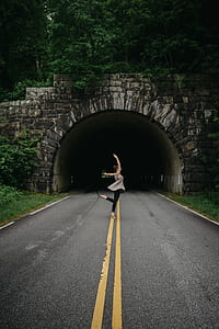 woman posing on road thumbnail