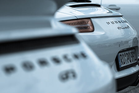 white Porsche car thumbnail