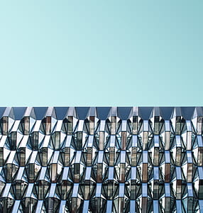 glass building under blu sky thumbnail