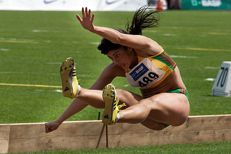athlete jumping on field thumbnail