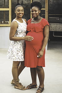 Women Standing Beside Each Other thumbnail