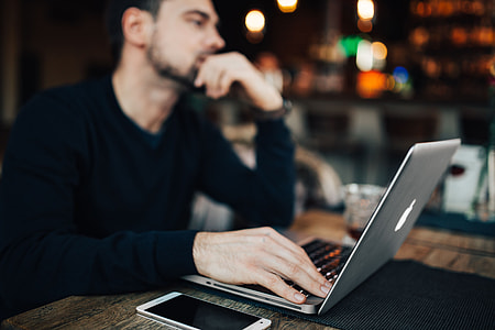 Young Entrepreneur Working from a Modern Cafe thumbnail