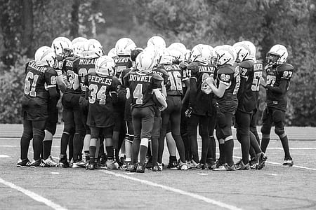 grayscale photo of football team thumbnail