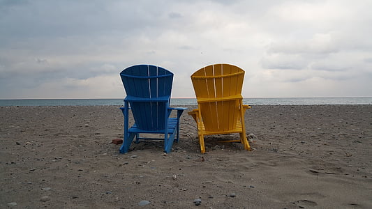 blue and yellow wooden adirondack chairs thumbnail