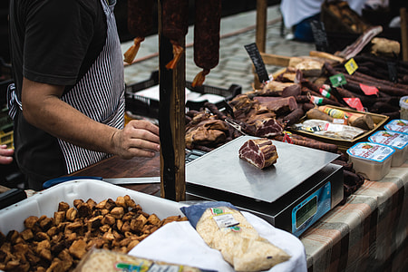 Meat vendor at farmers market thumbnail