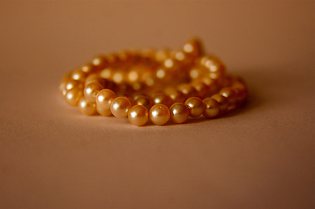 close-up of brown necklace thumbnail