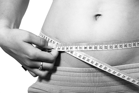 person measuring waist thumbnail