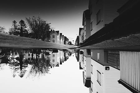 grayscale photography of village thumbnail