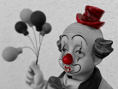 selective photo of clown with balloons thumbnail
