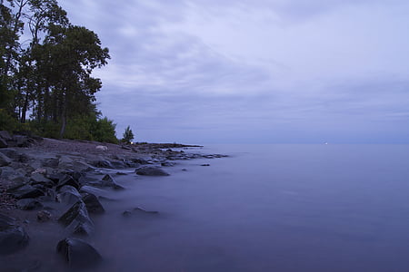 sea shore under cloudy sky thumbnail