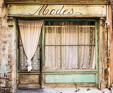 closed green wooden framed door and window thumbnail