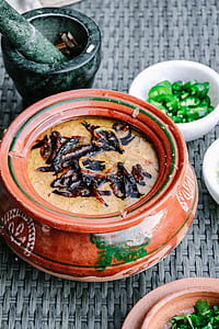 brown clay pot with food thumbnail