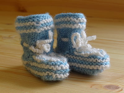 toddler's pair of blue-and-white knit boots thumbnail
