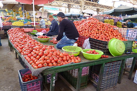 men selling tomatoes in public market thumbnail