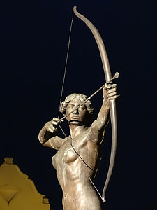 gray statue of man holding composite bow thumbnail