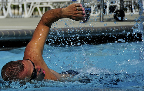 man doing freestyle stroke swimming thumbnail