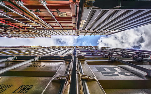 worm's eye view of freight containers thumbnail